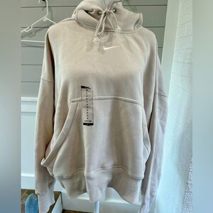 cream colored Nike oversized hoodie, size small
